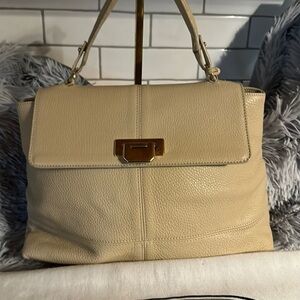 Luxury brand Bric’s purse handbag with dust cover.